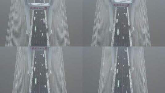 航拍武汉长江二桥冬天下雪车流高清在线视频素材下载