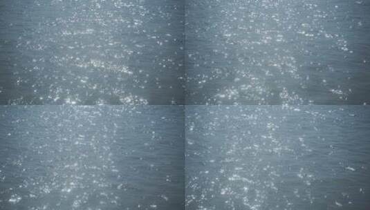 移动的水面波光粼粼湖面阳光照射海水江河面高清在线视频素材下载