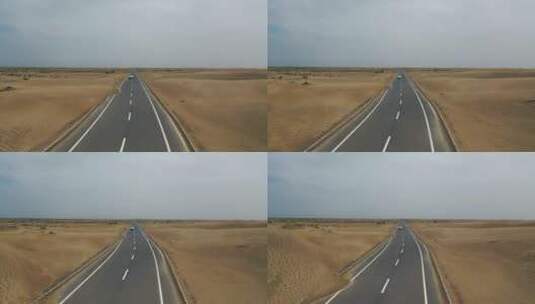 航拍沙漠公路行驶的汽车荒漠戈壁笔直的公路高清在线视频素材下载