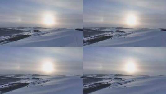 航拍冷空气笼罩的苍茫雪原夕照高清在线视频素材下载