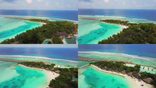 航拍海浪冲击沙滩海岛森林椰子树马尔代夫高清在线视频素材下载