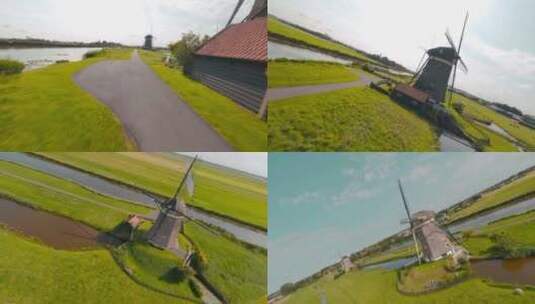 FPV无人机航拍荷兰风车羊群农场牧场草地高清在线视频素材下载