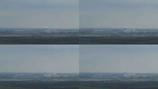 云彩下面远处的工厂延时摄影高清在线视频素材下载