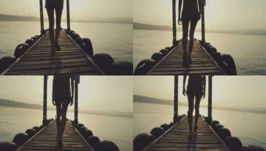 在海边小桥上散步的女孩高清在线视频素材下载