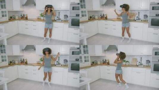 戴着虚拟现实眼镜的女人在厨房跳舞高清在线视频素材下载