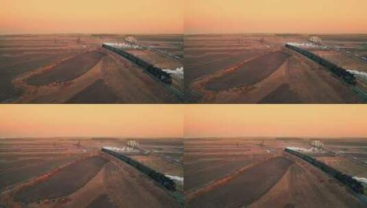 中国东北老式蒸汽机车火车日落航拍高清在线视频素材下载