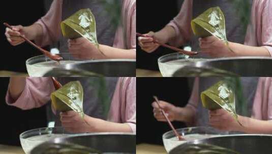 手工包制粽子的儿童特写高清在线视频素材下载