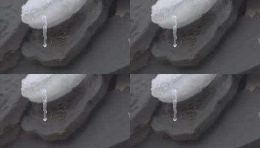 瓦片上融化的积雪高清在线视频素材下载