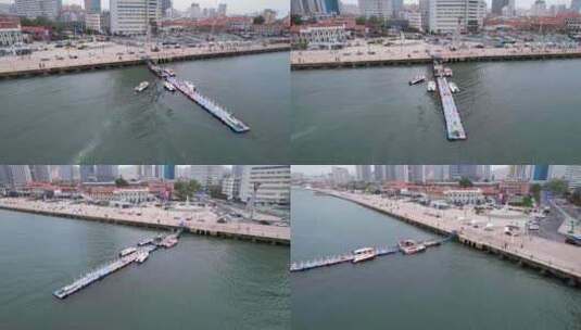 烟台海边滨海广场海面上的观光游艇浮桥码头高清在线视频素材下载