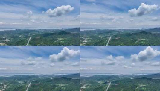 蓝天白云下远眺庐山市航拍延时高清在线视频素材下载