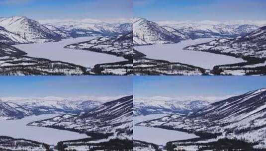 航拍新疆冬季喀纳斯河流晨雾雪山森林雪景高清在线视频素材下载