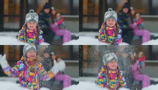 小女孩在开心地玩雪高清在线视频素材下载
