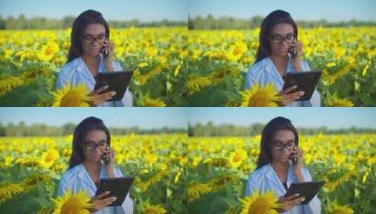 女农学家在田间打电话办公高清在线视频素材下载
