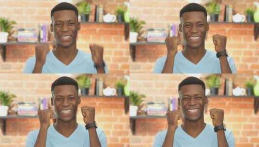 非洲男孩庆祝成功的手势高清在线视频素材下载