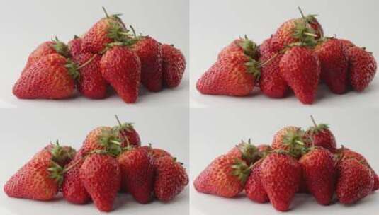 旋转拍摄新鲜爆浆草莓高清在线视频素材下载