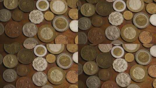 桌上的各种国际硬币高清在线视频素材下载