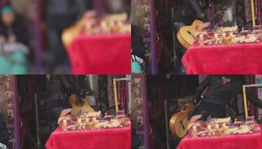 新疆街边吉他手拿吉他高清在线视频素材下载