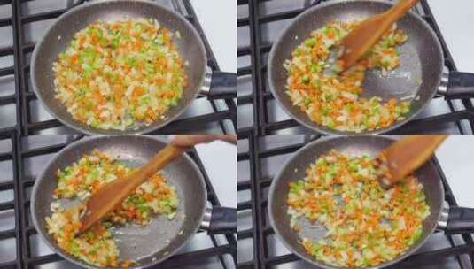 在煎锅里制作美味菜肴高清在线视频素材下载