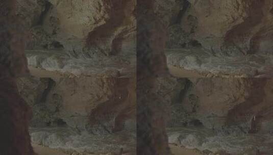 M1山洞中汹涌的地下暗河高清在线视频素材下载