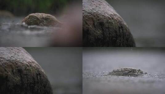 雨水拍打水面石块慢镜头高清在线视频素材下载
