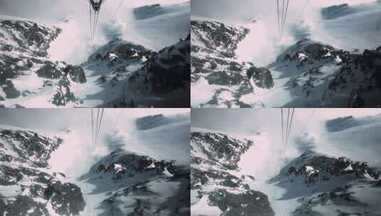 滑雪的POV在锯齿状山峰之间的电缆上沿着积雪的小径升起高清在线视频素材下载
