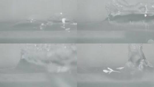 水滴落入水中慢镜升格特写实拍高清在线视频素材下载
