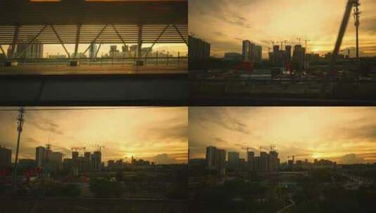 高铁飞驰经过站台窗外城市夕阳高清在线视频素材下载