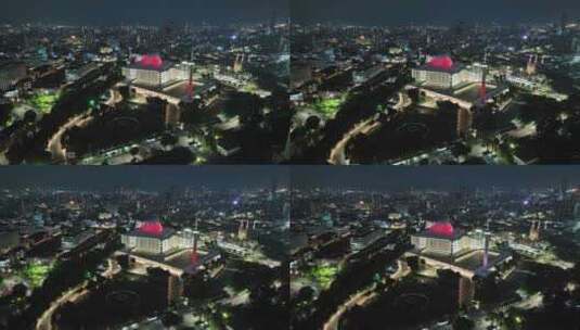 印尼雅加达伊斯蒂克拉尔清真寺城市夜景航拍高清在线视频素材下载