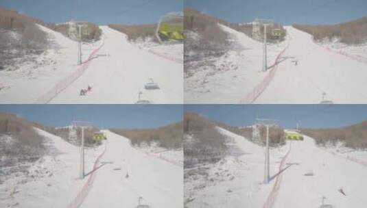 云顶滑雪场吊椅缆车上的画面高清在线视频素材下载