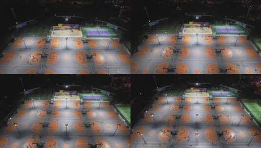 夜晚体育场运动打篮球踢足球航拍高清在线视频素材下载