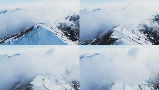 航拍夹金山雪山云雾缭绕自然风景高清在线视频素材下载