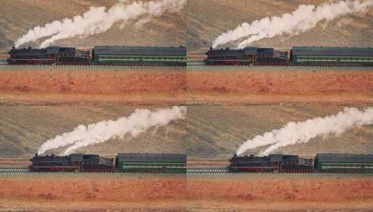 中国东北老式蒸汽机车火车日落航拍高清在线视频素材下载