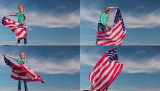 女孩在蓝天上挥舞美国国旗高清在线视频素材下载