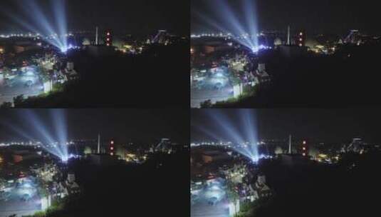 航拍上海欢乐谷游乐设施夜景灯光秀高清在线视频素材下载