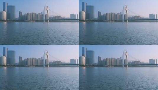 清晨阳光照耀在珠江猎德大桥和城市摩天大楼高清在线视频素材下载