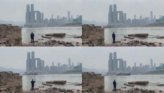 重庆南滨路钓鱼的男人高清在线视频素材下载