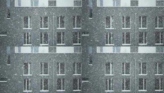 冬天雪花飘落建筑物大楼小区高清在线视频素材下载