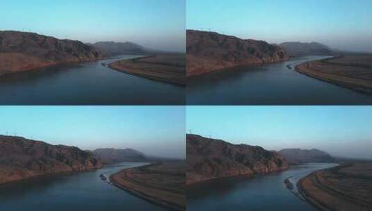 夕阳下平静流淌的黄河航拍高清在线视频素材下载