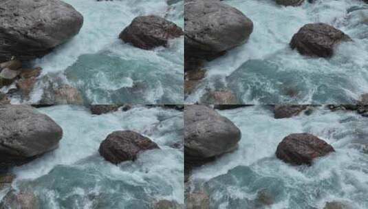 西藏察隅桑曲河在巨石间波涛汹涌高清在线视频素材下载