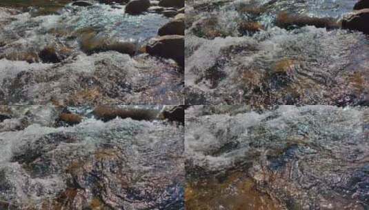 小溪中清澈的溪水冲刷鹅卵石-武夷山九曲溪高清在线视频素材下载
