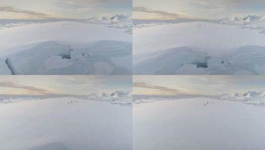 南极半岛白色冰川中的蓝色冰洞航拍特写高清在线视频素材下载