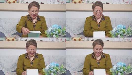 室内坐着的中老年女性高清在线视频素材下载