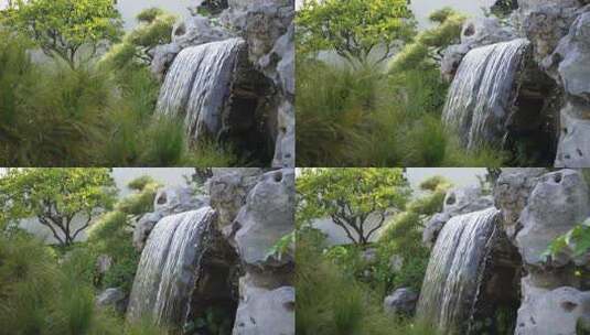 传统中式园林内的假山瀑布高清在线视频素材下载