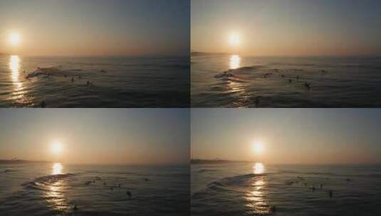日落时海上的冲浪者高清在线视频素材下载
