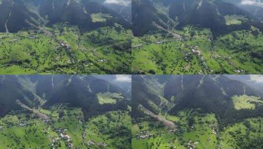使用无人机从一个被森林和自然包围的村庄的高空进行航空摄影高清在线视频素材下载