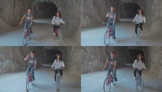 旅游情侣在石路上骑单车高清在线视频素材下载