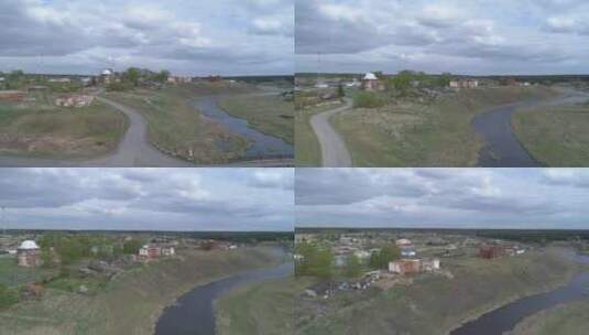 河岸上建筑物被毁的旧村庄鸟瞰图01高清在线视频素材下载