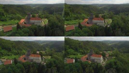 无人驾驶飞机环绕着康涅狄格州格林山脉历史悠久的欧洲城堡斯沃贾诺夫的俯视图高清在线视频素材下载