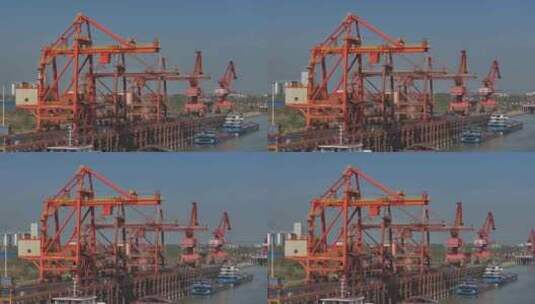 4K航拍鄂州地标三江港货运码头整齐的港机高清在线视频素材下载
