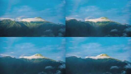 【延时】一束光照亮雨雾缭绕的绿色山顶上高清在线视频素材下载